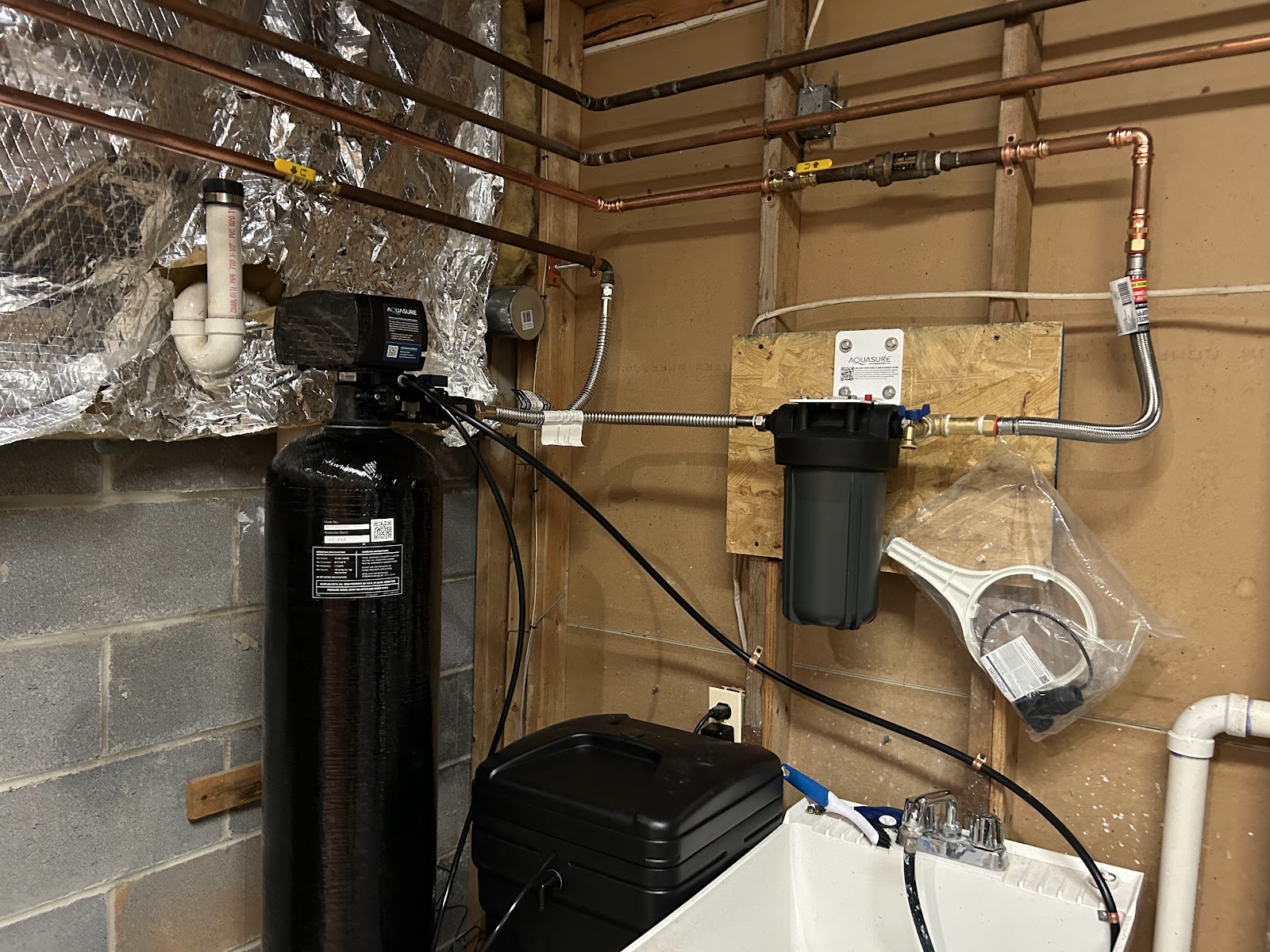 Whole-home water treatment and softener system install